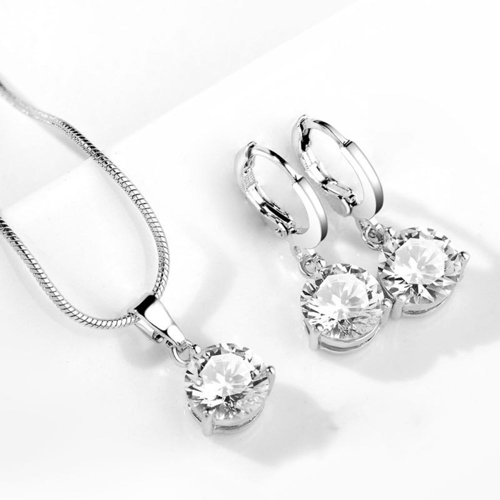 Designs & You Cubic Zirconia Studded Solitaire Contemporary Necklace Set (Silver)