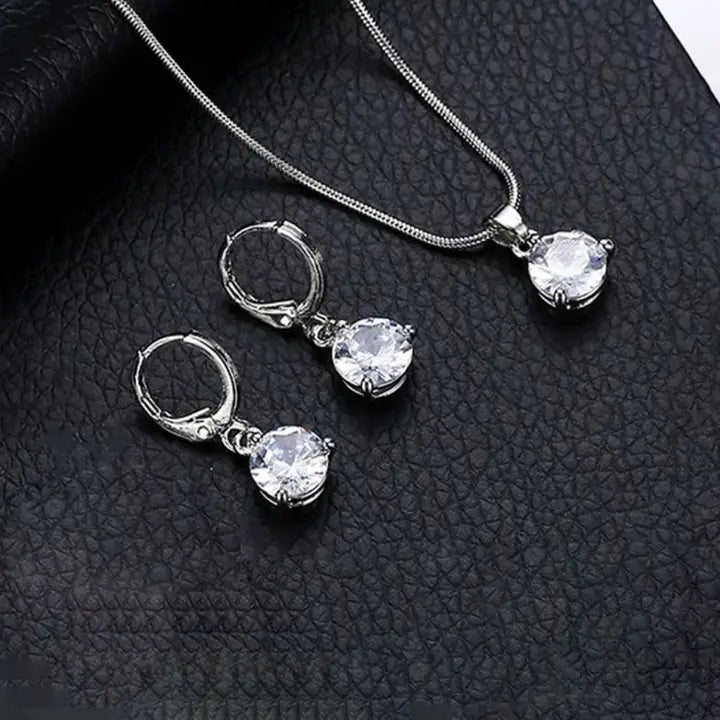 Designs & You Cubic Zirconia Studded Solitaire Contemporary Necklace Set (Silver)