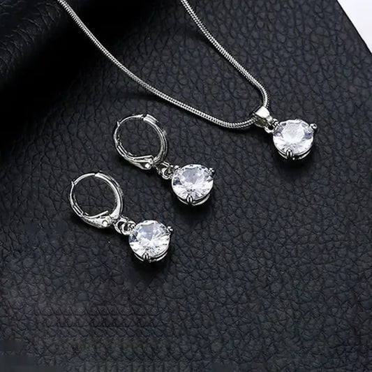 Designs & You Cubic Zirconia Studded Solitaire Contemporary Necklace Set (Silver)